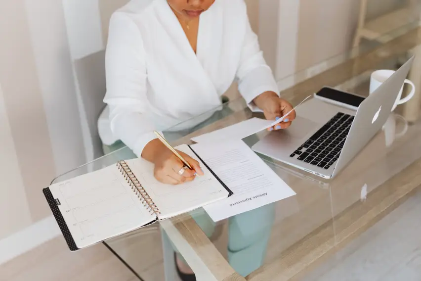 A woman writing notes